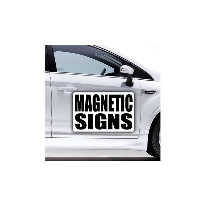 Side of a silver car showing custom magnetic sign